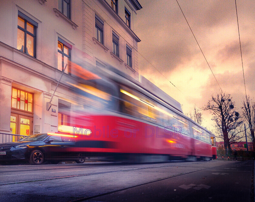 20241128 073713x 
 Tram in Vienna 
 Keywords: tram, sunset, movement